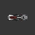 Custom Silver Motorcycle With Red Seat Black Handlebars And Metallic Engine Details
