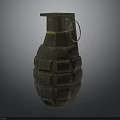 Military Style Hand Grenade With Textured Green Shell And Metal Fuse Ring