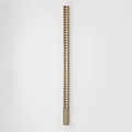 Modern Slim Metal Wall Light Featuring Perforated Pattern On White Wall Background