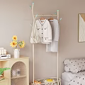Standing Clothes Rack With White Coat Gray Sweater Beige Bag Blue Hooks In Cozy Bedroom