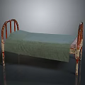 Rusted Iron Bed Frame with Red White Accents and Green Cloth Covered Mattress