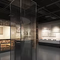 Museum Exhibition Hall Interior Featuring Glass Display Cases And Wall Exhibits