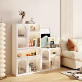 Elegant Modern White Sideboard With Glass Doors And Display Shelves Holding Food Jars And Artwork