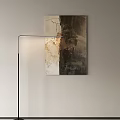 Contemporary Floor Lamp With Slim Metal Stand Illuminating Abstract Textured Wall Art