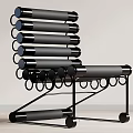 Modern Black Leisure Chair With Metal Frame Cylindrical Cushions And Circular Ring Details