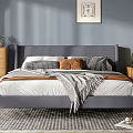 Gray Bedroom Interior With Gray Walls Bed Wooden Furniture Floor Lamp Rug Artwork And Plants