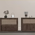 Wooden Entryway Cabinet And Sideboard With Rattan Panels And Decorative Vase Lantern Figurines