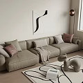 Modern Beige L shaped Sofa Coffee Table Set With Decorative Pillows Throw Blanket Abstract Art Floor Lamp