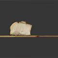 Sliced Bread On Wooden Cutting Board With Crusty Top And Natural Texture
