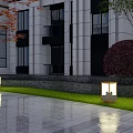 Outdoor Lights Illuminating Modern Building Exterior With Lawn And Stone Path