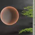Green Leisure Chair With Orange Round Decor Dark Wall Green Plants And Glass Partition