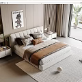 Modern Double Bed with Soft Headboard Plush Pillows Brown Throw Blanket and Light Carpet