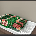 Fresh Packaged Meat Products in Green Trays with Various Slices Displayed on Foil Tray