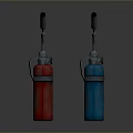 Red and Blue Safety Fire Extinguishers Standing Side by Side on Dark Surface