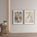 Abstract Framed Paintings On Wall With Woven Side Table And Plants 3d model