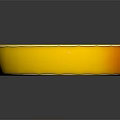 Yellow Circular Shiny Object with Central Star Shape and Glossy Finish on Dark Background