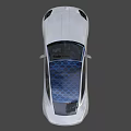 Sleek Silver Car With Blue Honeycomb Roof Design And Sporty Alloy Wheels