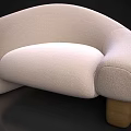 Cream Curved Two Seater Sofa With Wooden Legs And Soft Velvet Upholstery