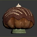 Sweet Round Dessert With Red Frosting White Drizzle And Whipped Cream Top