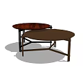 Two Round Wooden Coffee Tables With Brown Finish And Cross Leg Design