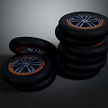 Stacked Car Tires With Alloy Wheels And Orange Trim Accents Design