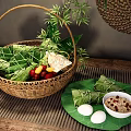 Traditional Glutinous Rice Dumplings Wrapped In Bamboo Leaves With Boiled Eggs Porridge And Wicker Basket