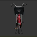 Red Bicycle With Black Front Basket Black Seat And Gold Rims On Reflective Surface