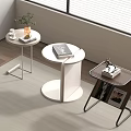 Modern Coffee Table Set With White Round Design Black Metal Frame And Decorative Books