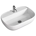Modern White Ceramic Oval Bathroom Washbasin With Sleek Faucet And Smooth Surface Design