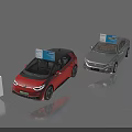 Interactive Zone With Red And Gray Cars Display Boards And Signage