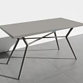 Modern Minimalist Outdoor Table With Matte Grey Tabletop And Sturdy Cross Metal Support Legs