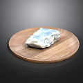 Blue And White Food Item On Round Wooden Plate With Smooth Surface