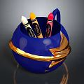 Stylish Blue Pen Holder With Gold Decoration And Colored Crayons