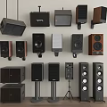 Various Headphones and Speakers with Modern Designs for Home Audio Use
