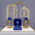 Luxurious Gold Metal Frame Display With Blue Decorative Centerpiece On White Stand