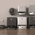 Modern Home Use Appliances Featuring Robot Vacuums In Different Colors And Styles