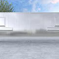 Modern Silver Metal Gate With Stone Pillars on Sides Against Blue Sky and Green Trees