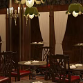 Elegant Restaurant Interior with Wooden Walls White Curtains and Benches