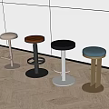 Modern Bar Stools With Various Colors And Metal Bases In Kitchen With Wooden Floor