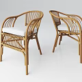 Two Rattan Armchairs with White Cushions and Modern Woven Design Structure