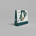 Green Gift Bag With Decorative Design And Chinese Characters On Surface