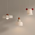 Three Modern Pendant Lights with White Ceramic Bodies and Red Brown Decorative Balls