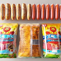 Packaged Sausages Arranged In Rows With Lion Logo And Nutrition Information Packaging