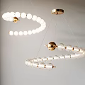Modern Spiral Chandelier Design With Glass Globes And Gold Metal Accents