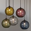 Colorful Glass Spherical Pendant Lights Hanging With Illuminated Bulbs In Modern Interior