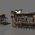 Traditional Ancient Stilted Buildings With Wooden Frames And Thatched Roofs Over Water