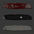 Three Utility Knives with Red Black Silver Designs and Metallic Handles