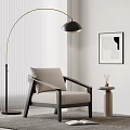 Beige Cushioned Leisure Chair With Black Wooden Frame Arched Floor Lamp And Abstract Wall Art