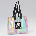 Iridescent Transparent Tote Bag With Black Straps And Label Featuring Text And Design