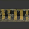 Worn Concrete Road Barrier With Yellow And Black Stripes For Traffic Safety